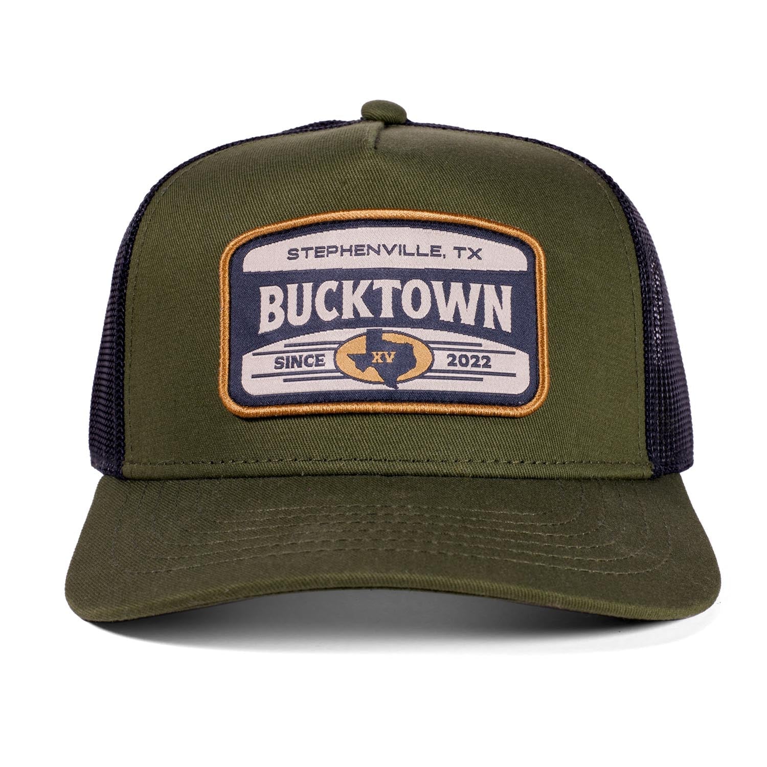 Front view of the Bucktown Outrider Hat by Rural Cloth, an olive green trucker with mesh back. The front patch shows a steer head, "Stephenville, TX Bucktown XV Ranch Since 2022," and the Roman numeral XV.