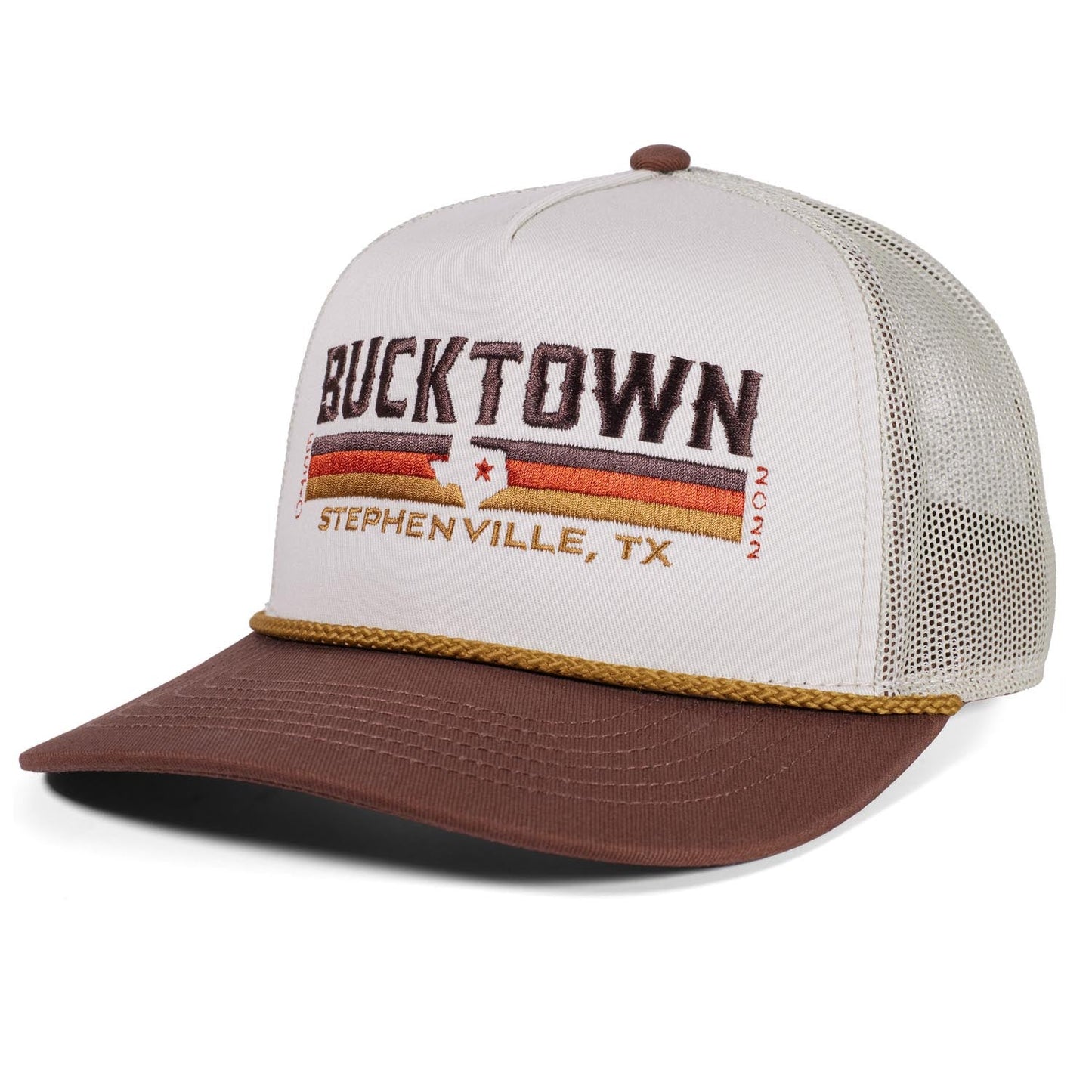The Bucktown Revival Hat by Rural Cloth features a white front panel, brown bill, "BUCKTOWN" and "STEPHENVILLE, TX" embroidery with stripes, plus an adjustable snapback and mesh back.